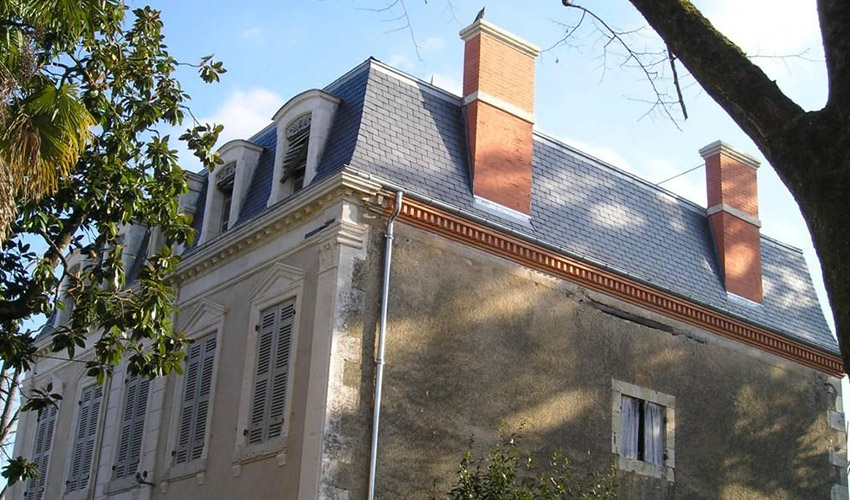 Pose de couverture en tuiles plates à Condom