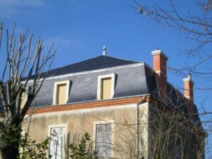 Pose de couverture en tuiles plates à Condom